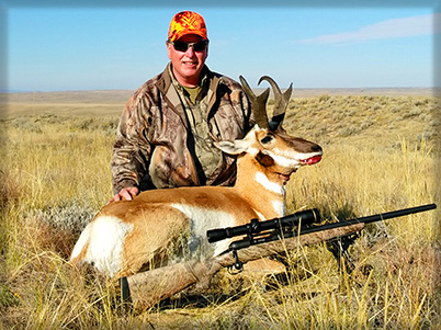 FATHER/SON ENJOYING THEIR SWEETWATER OUTFITTERS HUNT