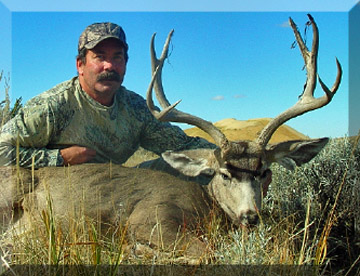 JOHN WITH ANOTHER BUCK HARVESTED WITH SWEETWATER OUTFITTERS.