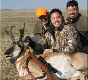 RAY & GARY WITH HIS WIDE MULE DEER BUCK